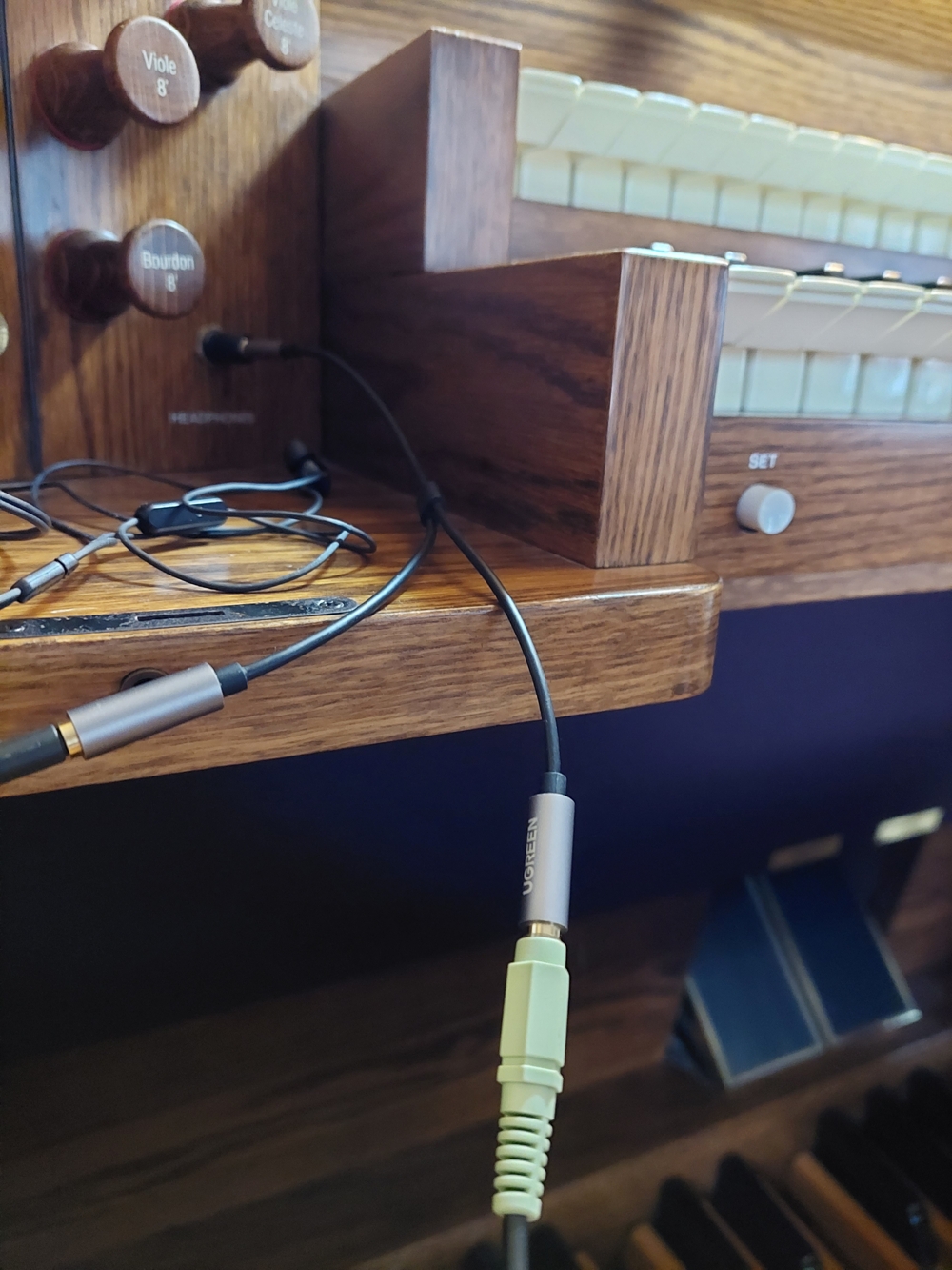 headphone jack on an electronic organ with cables